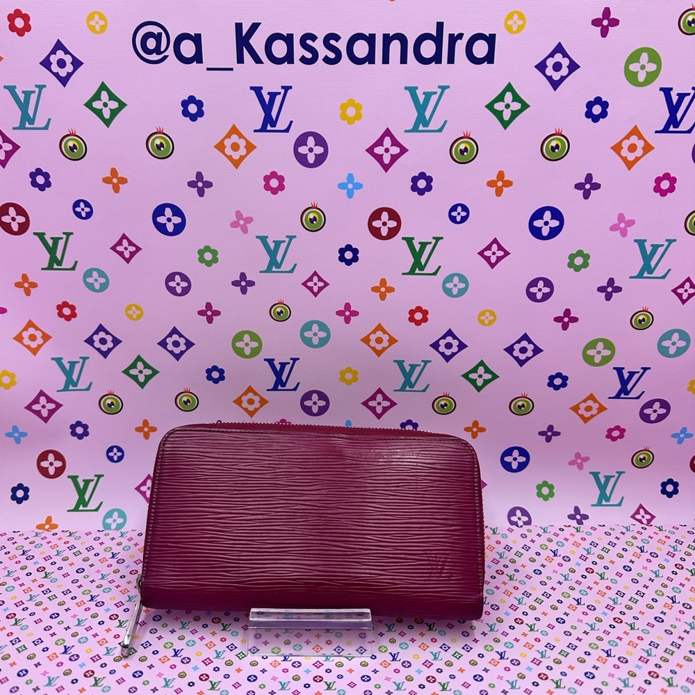 Louis Vuitton Epi Zip Around Wallet in Magenta